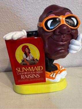 Vintage 1987 Sun-Maid California Raisins plastic coin bank
